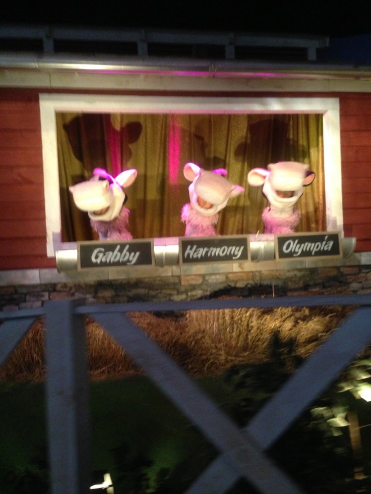 Three cows singing